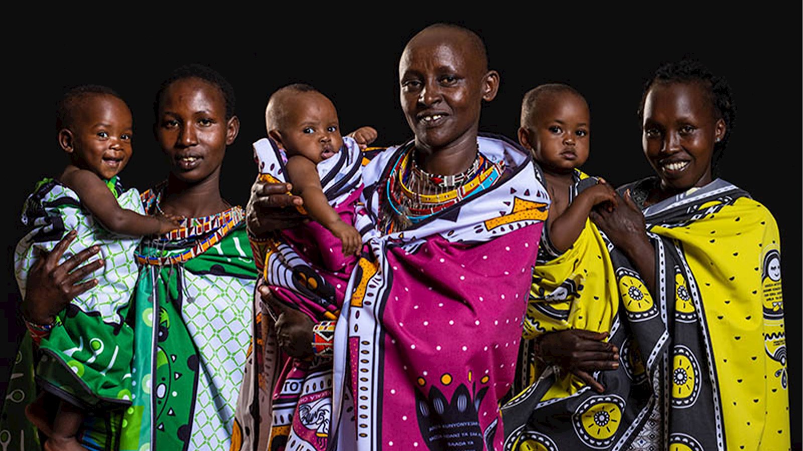 Kenyan parents with their babies in lessos