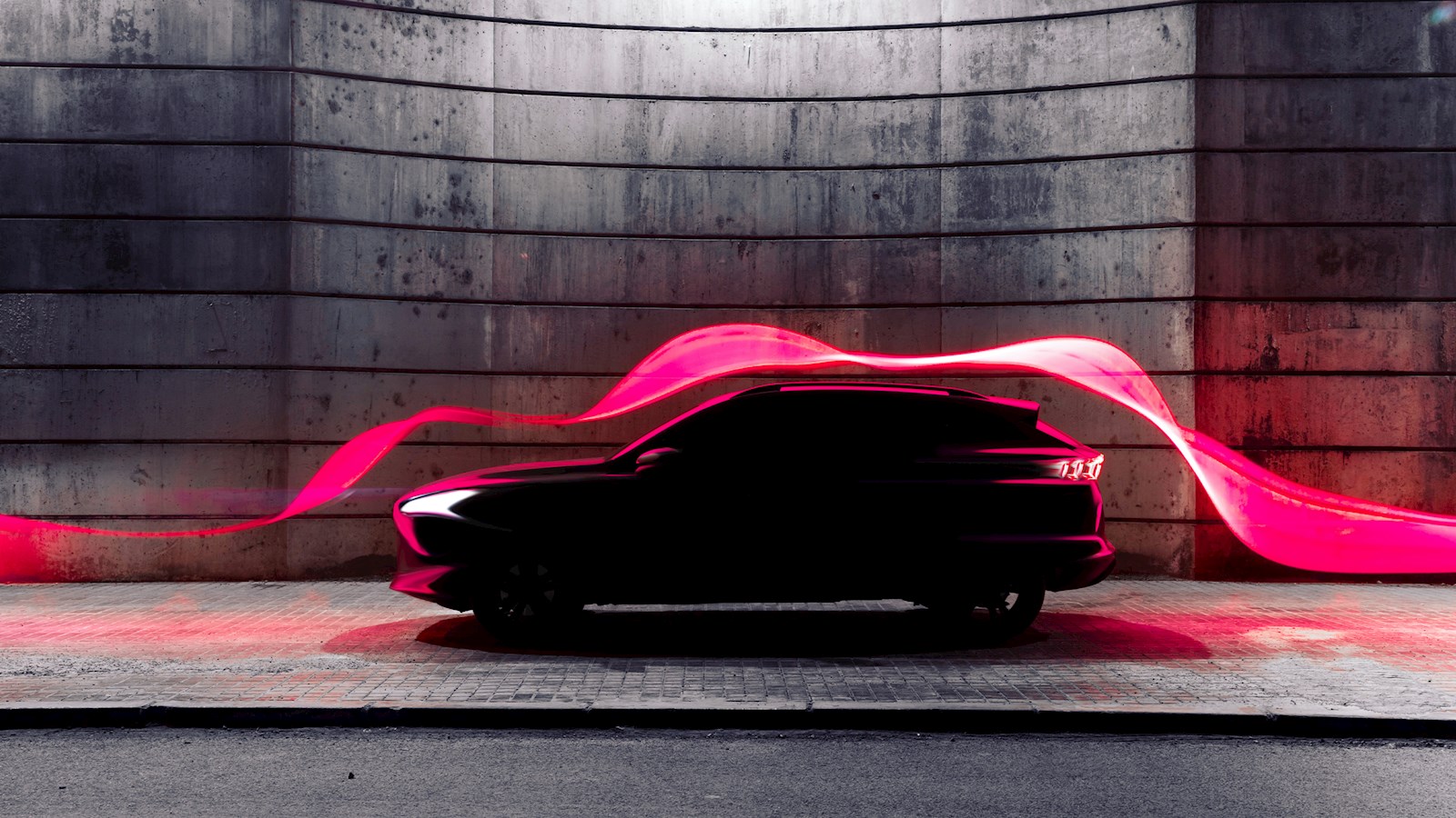 Modern car with futuristic aerodynamic red light trail flowing